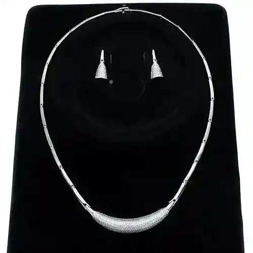 Rhodium CZ Jewelry Set with sparkling cubic zirconia necklace and earrings on black background