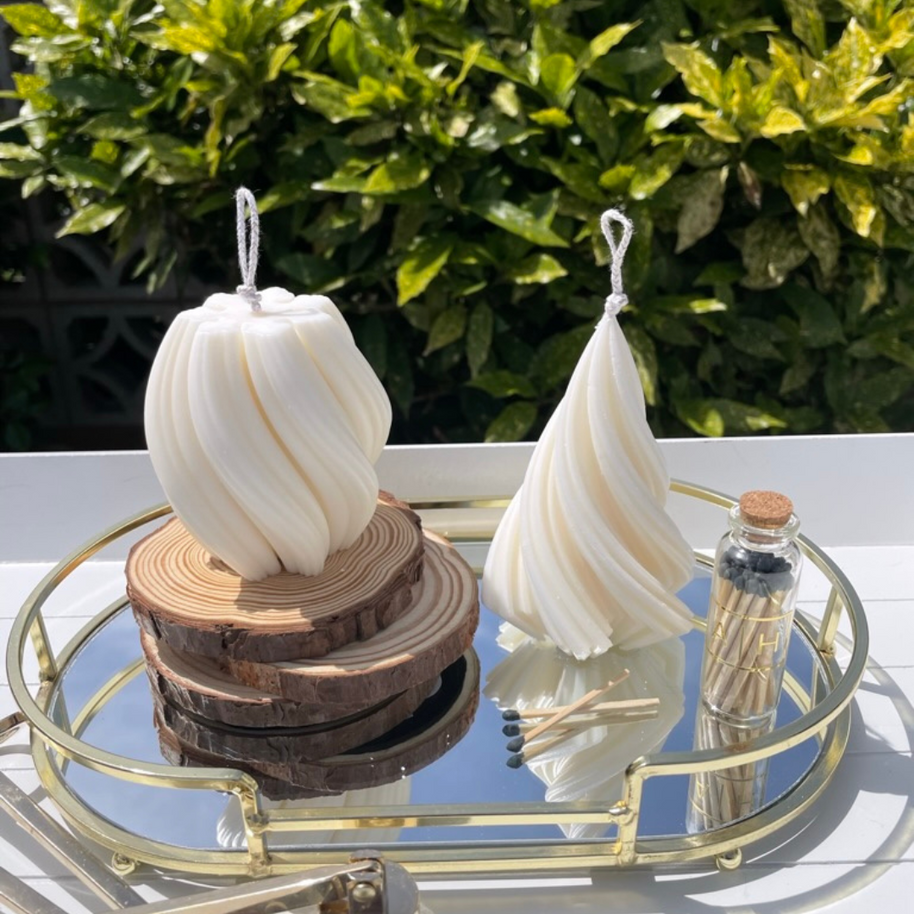 Hand-poured soy blend pillar candles from The Twirl collection with twisted design, natural cotton wick, and eco-friendly packaging for home decor and gifts.