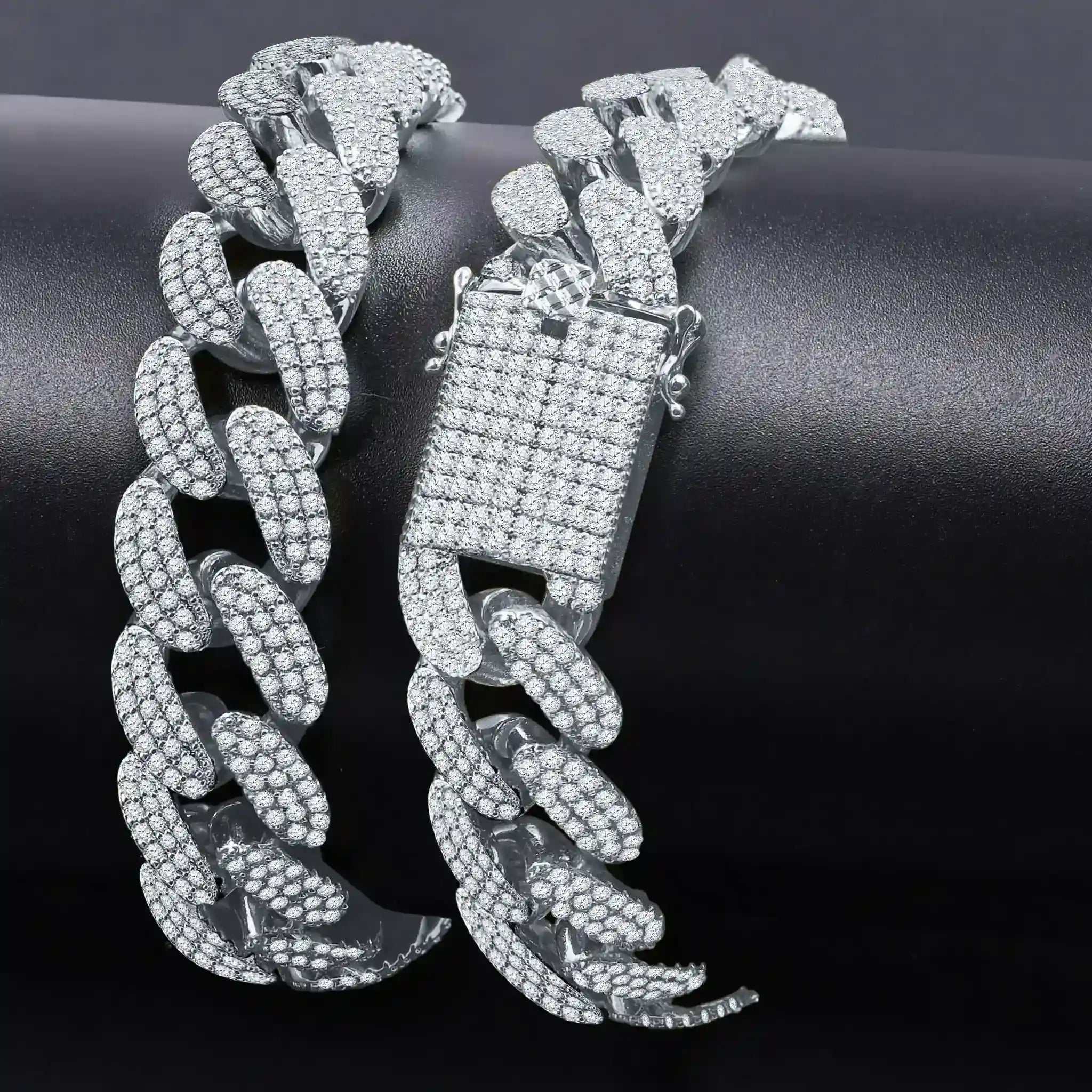 Close-up of Stallion Iced 18 mm Cuban Chain with sparkling cubic zirconia stones on black background