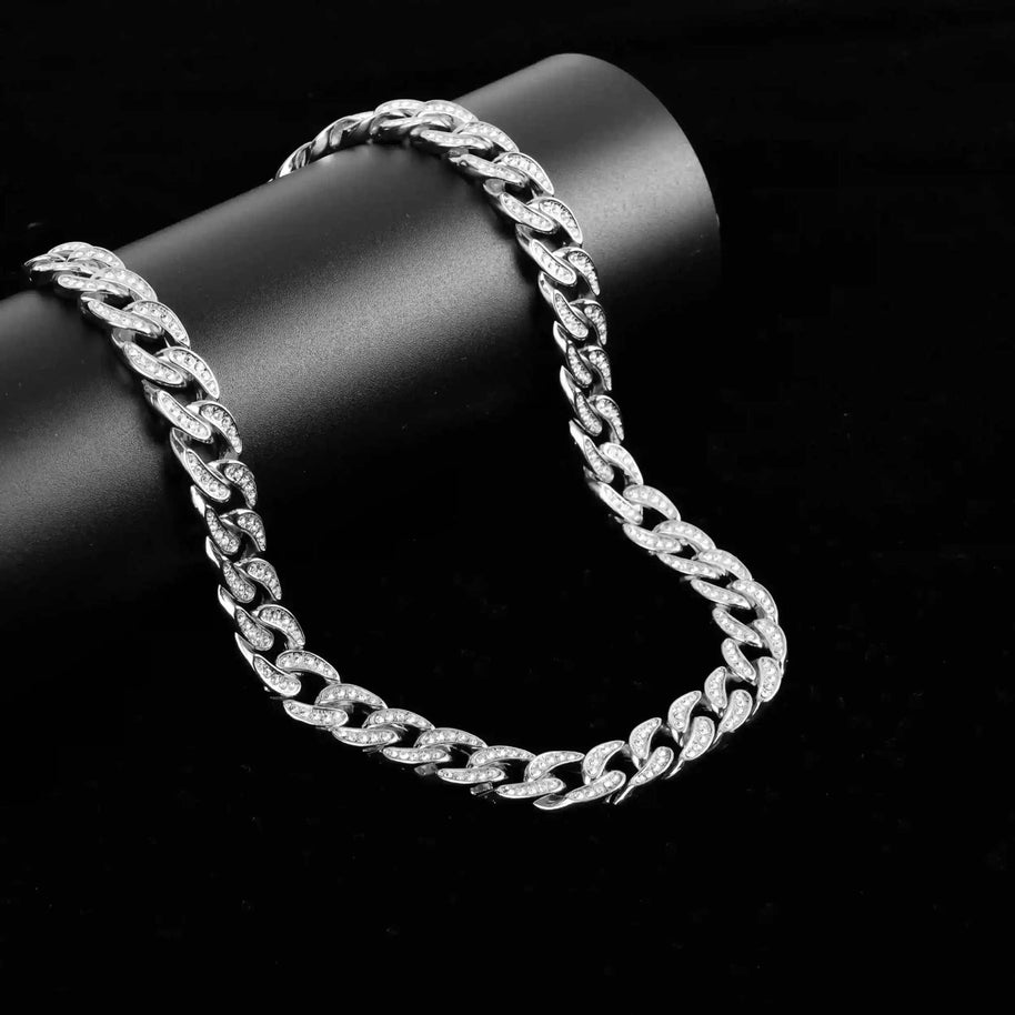13 mm iced Cuban chain in rhodium with rhinestone crystals and fold-over clasp on black background