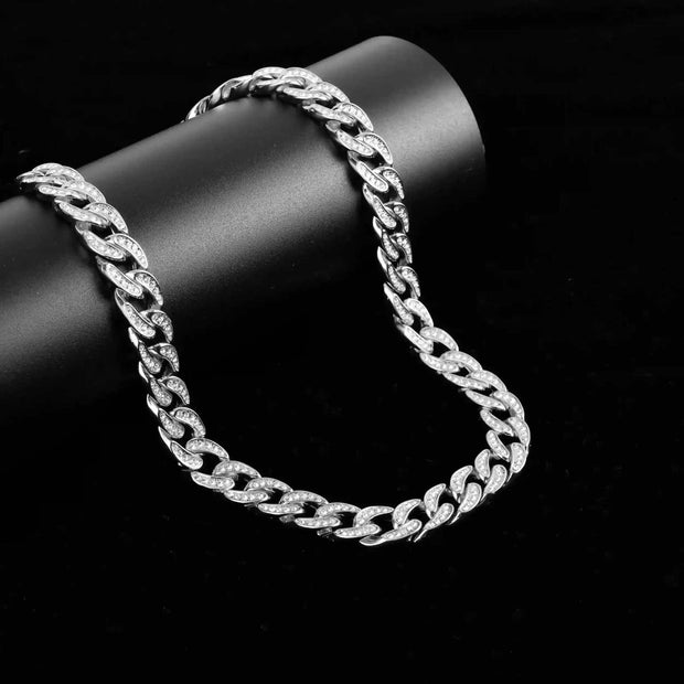 13 mm iced Cuban chain in rhodium with rhinestone crystals and fold-over clasp on black background