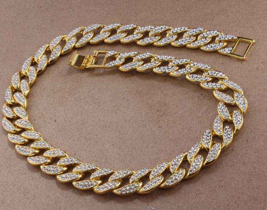 Gold Crystal Cuban Chain 8mm wide gold-plated brass with crystal-studded links and secure fold-over clasp