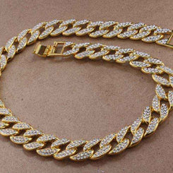 Gold Crystal Cuban Chain 8mm wide gold-plated brass with crystal-studded links and secure fold-over clasp