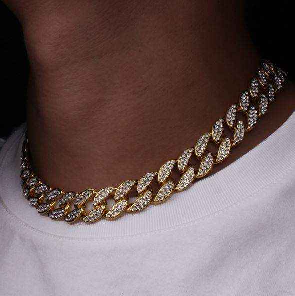 8 mm Gold Crystal Cuban Chain with sparkling crystals and 14K yellow gold plating worn on neck