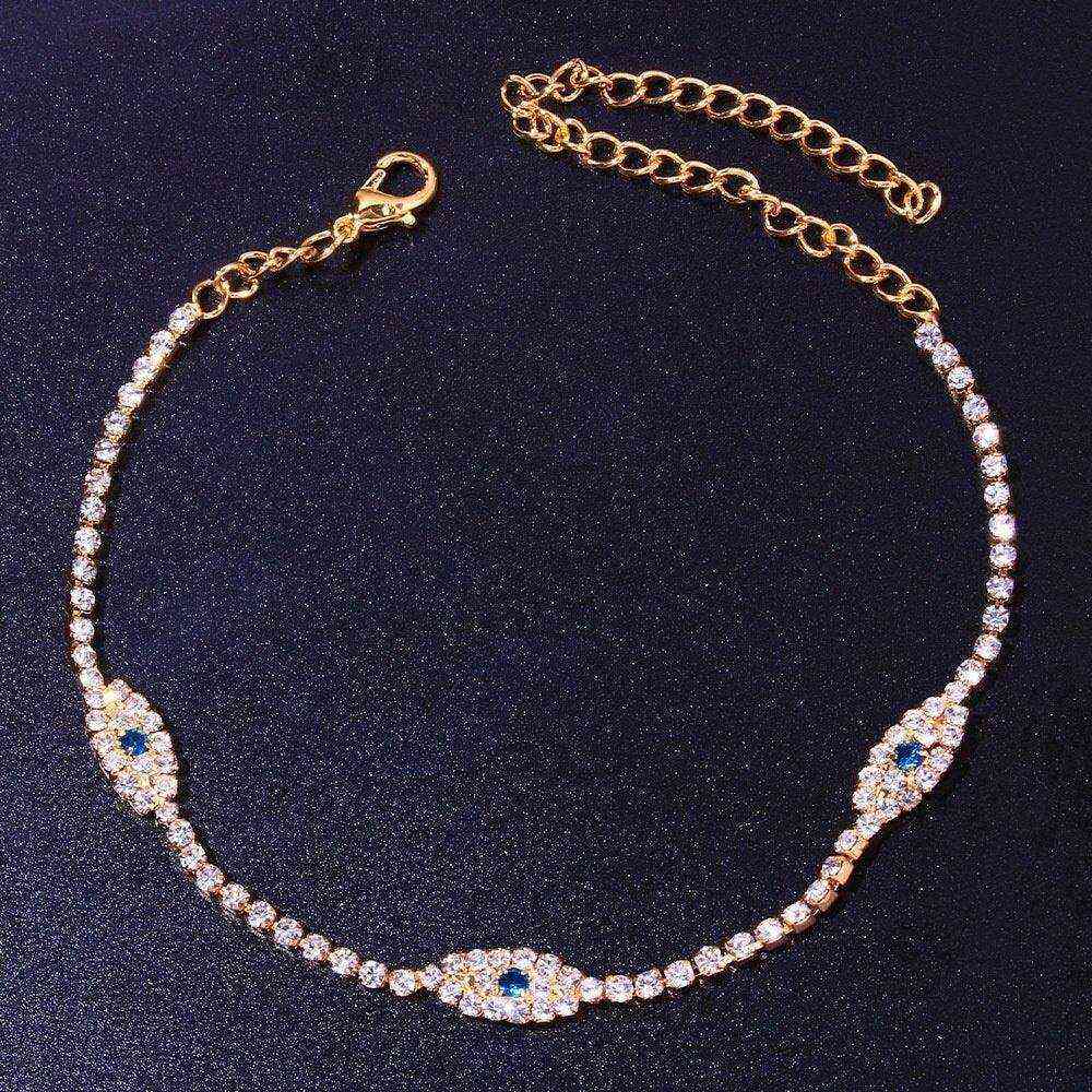 Vintage Evil Eye Crystal Anklet with blue evil eye charms and cubic zirconia stones in gold finish