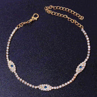 Vintage Evil Eye Crystal Anklet with blue evil eye charms and cubic zirconia stones in gold finish