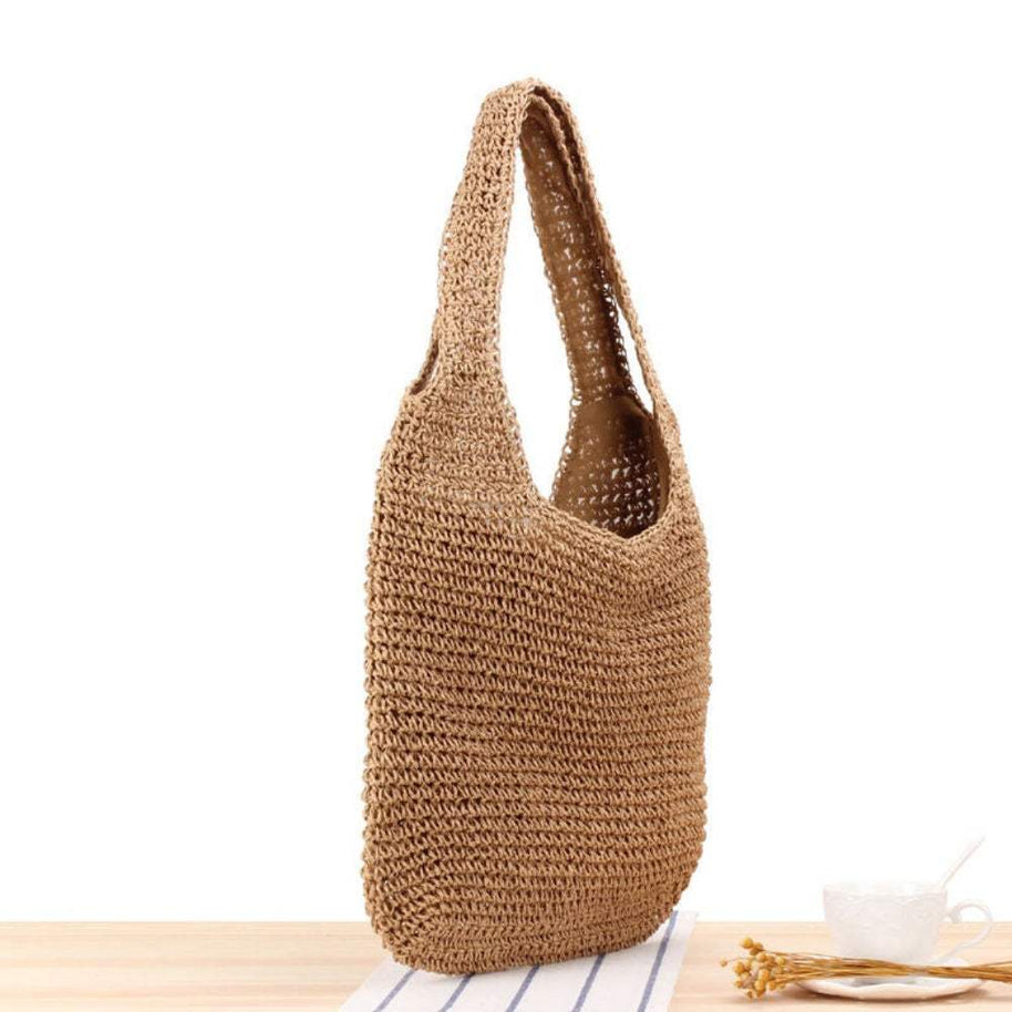 Casual summer shoulder beach bag made of straw with soft texture and large capacity for beach essentials