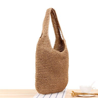 Casual summer shoulder beach bag made of straw with soft texture and large capacity for beach essentials