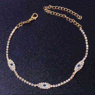 Vintage Evil Eye Crystal Anklet with blue evil eye charms and cubic zirconia stones on gold-color adjustable chain