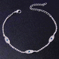 Vintage Evil Eye Crystal Anklet with blue evil eye charms and cubic zirconia stones on silver chain