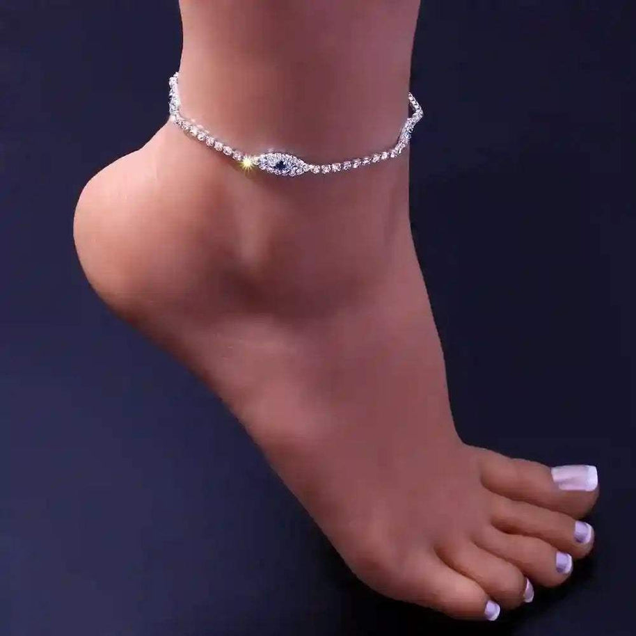 Vintage Evil Eye Crystal Anklet with blue eye charm and cubic zirconia stones on a silver chain worn on ankle