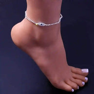 Vintage Evil Eye Crystal Anklet with blue eye charm and cubic zirconia stones on a silver chain worn on ankle