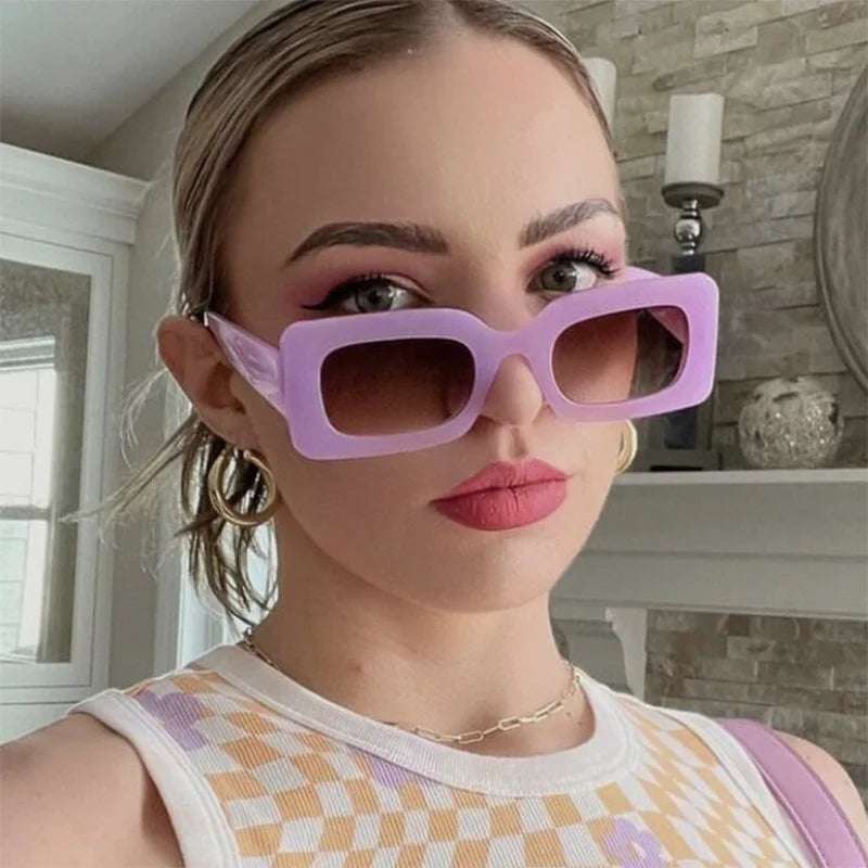 Woman wearing lavender vintage rectangle sunglasses with UV400 resin lenses and polycarbonate frame