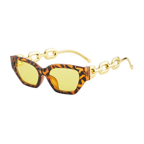 Fashion cat eye sunglasses with tortoiseshell frame, yellow mirrored lenses, and gold chain arms for UV400 protection