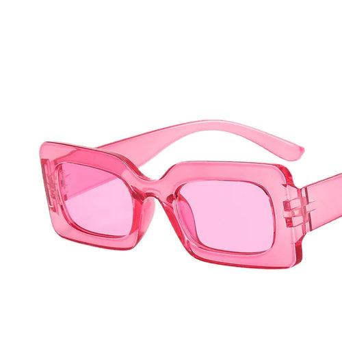 Pink vintage rectangle sunglasses for women with UV400 resin lenses and polycarbonate frame