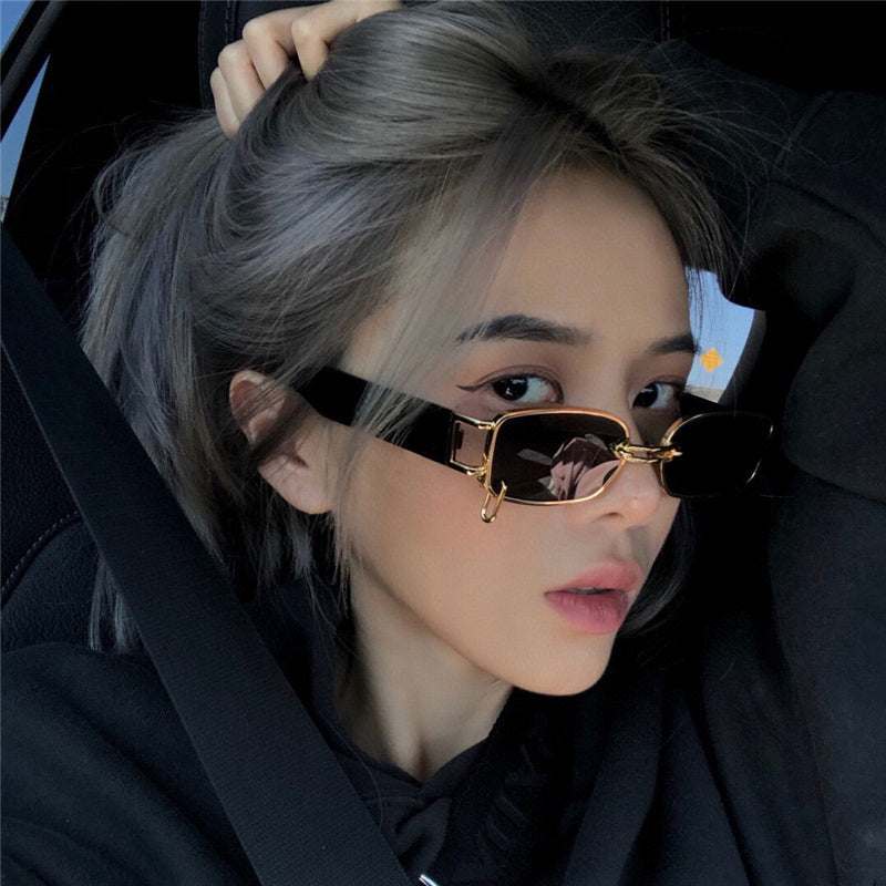 Trendy Korean style female sunglasses with square black and gold frame, UV400 protection, and comfortable nose pads.