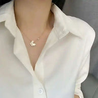 Butterfly Mother-of-Pearl Necklace with gold-plated chain worn with white blouse simple elegant accessory