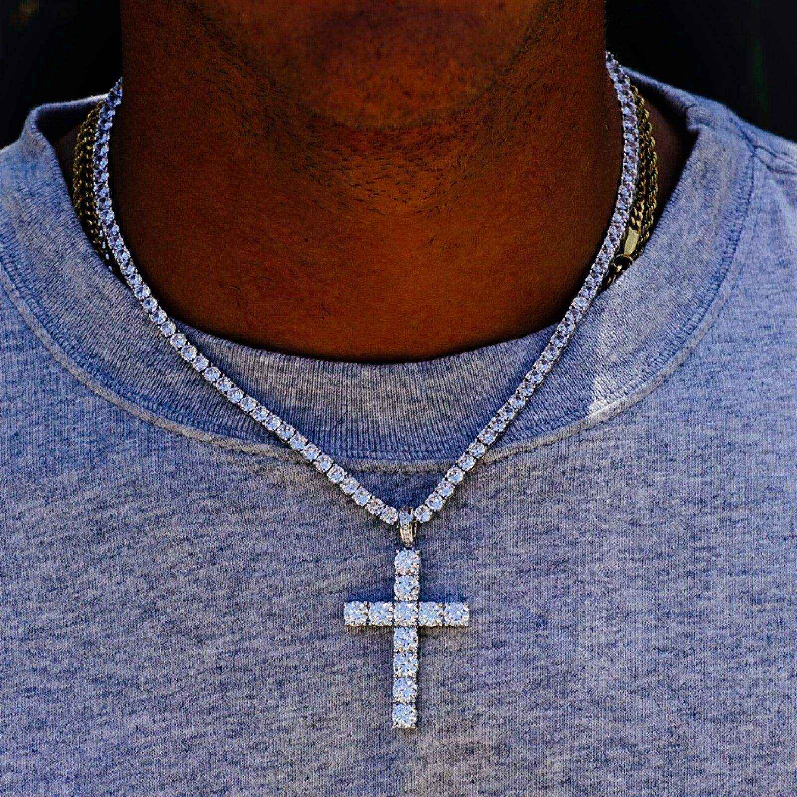 Galore 3 mm CZ Tennis Bundle featuring a slim tennis chain with a cubic zirconia cross pendant in silver finish worn on neck