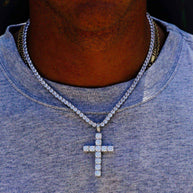 Galore 3 mm CZ Tennis Bundle featuring a slim tennis chain with a cubic zirconia cross pendant in silver finish worn on neck