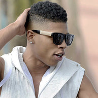 Jase New York Royce sunglasses in gloss black with rectangular frame and metal cross hatch temples worn by man