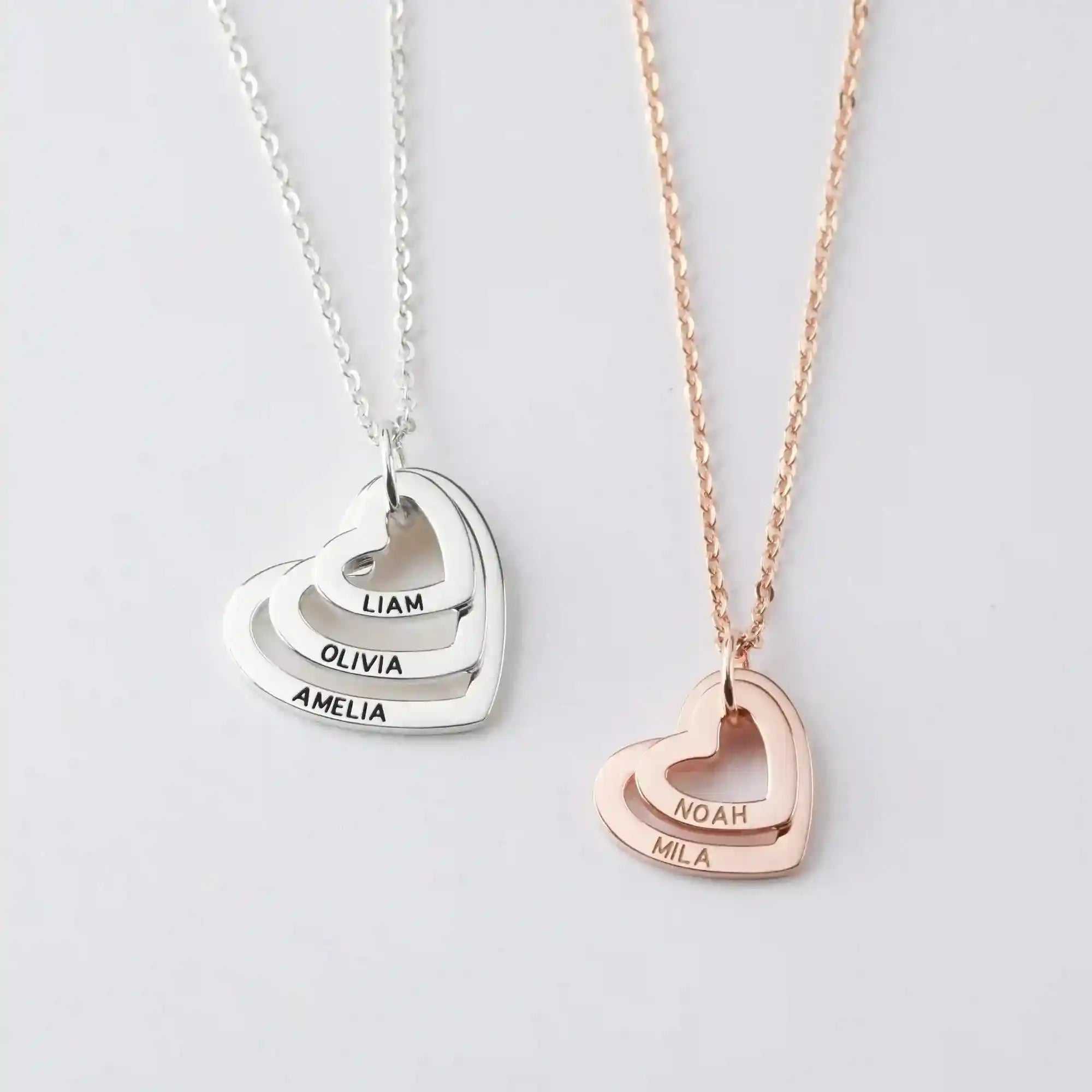 Two Grandma Heart Name Necklaces with personalized engraved names in silver and rose gold finishes