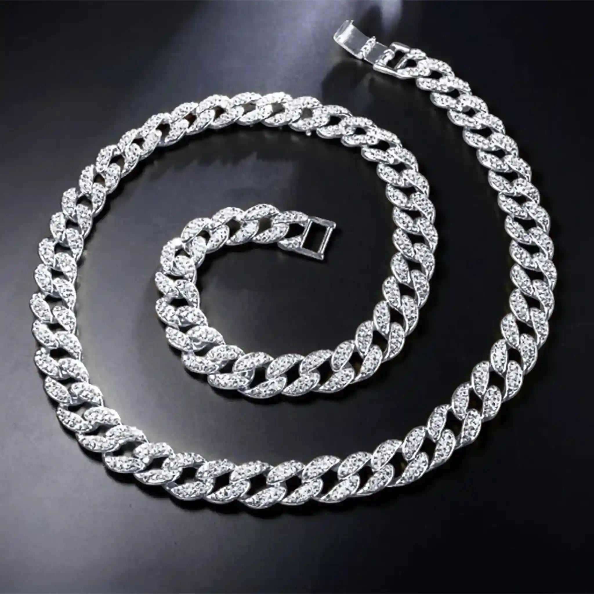 13 mm iced Cuban chain and bracelet set with rhodium plating and rhinestone crystals on black background