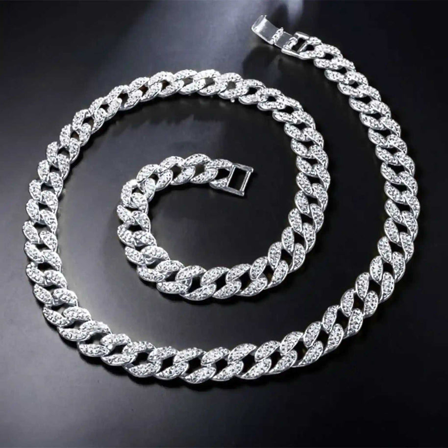 13 mm iced Cuban chain and bracelet set with rhodium plating and rhinestone crystals on black background