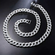 13 mm iced Cuban chain and bracelet set with rhodium plating and rhinestone crystals on black background