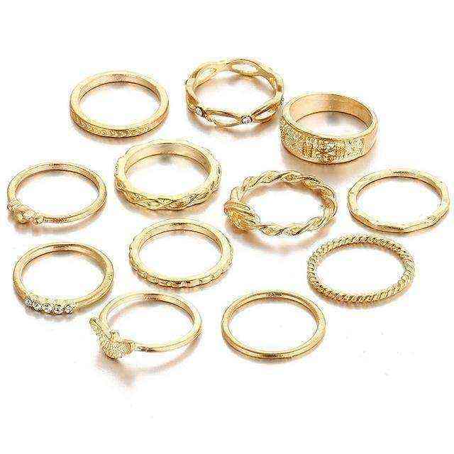 Set of 12 gold-tone Golden Gem Stackable Rings with various designs and stone accents