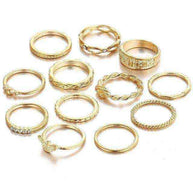 Set of 12 gold-tone Golden Gem Stackable Rings with various designs and stone accents