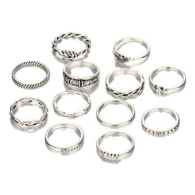 Set of 12 silver stackable rings with various designs and accents for versatile styling