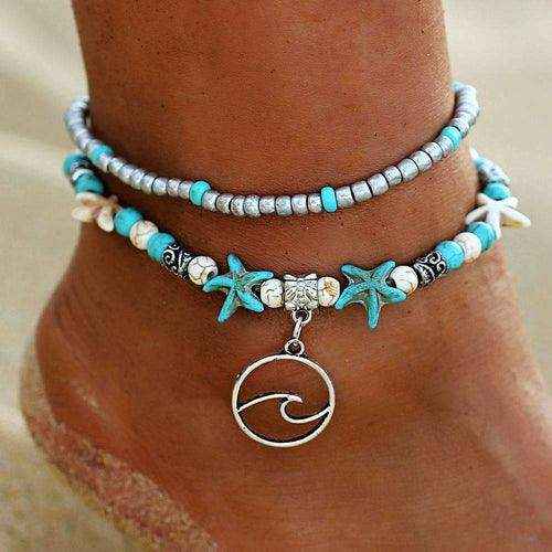 Ocean Double Layer Anklet with turquoise starfish beads and silver wave pendant on ankle