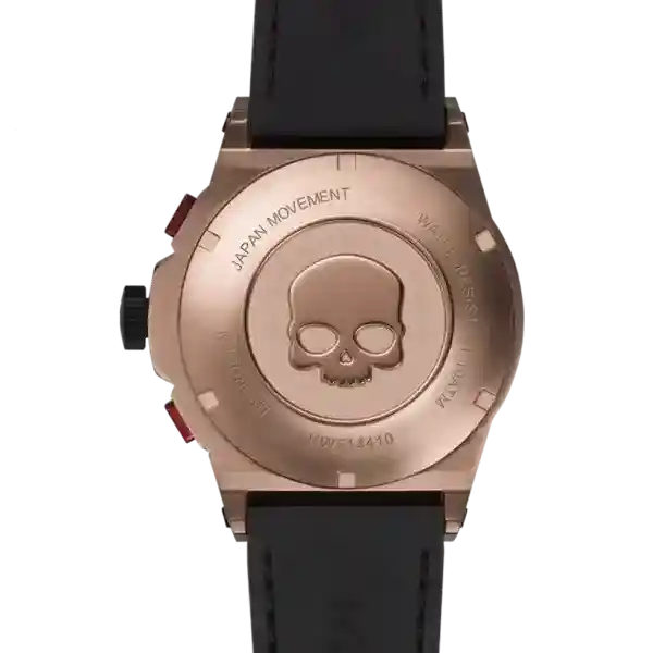 Back of Otto Chrono Watch with rose-gold plated steel case and black silicone strap featuring skull engraving