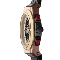 Otto Chrono Watch with rose gold case, yellow gold bezel, black carbon fiber dial, and black silicone strap.