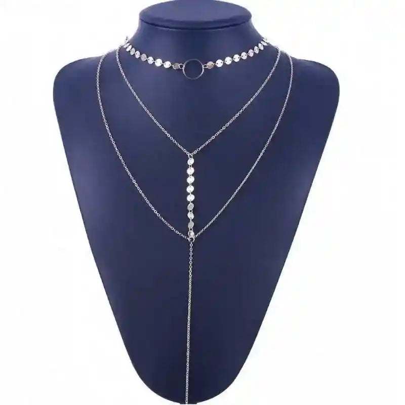 Three-Layer Lariat Choker with delicate chains and central circle pendant on display bust